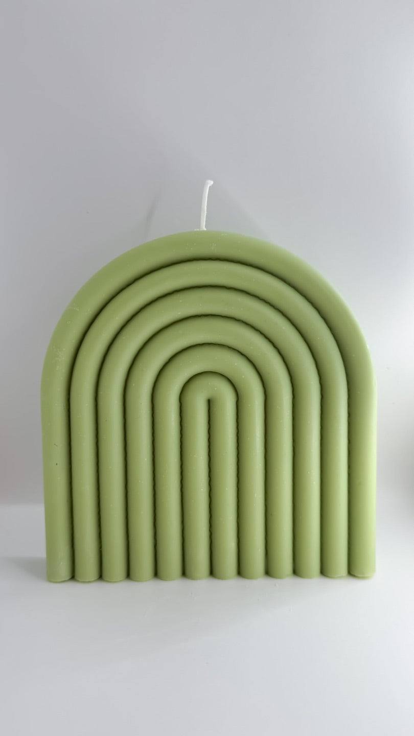 Bougie parfumee en forme d arche arc en ciel pistache