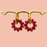 boucles oreilles soleil rouge