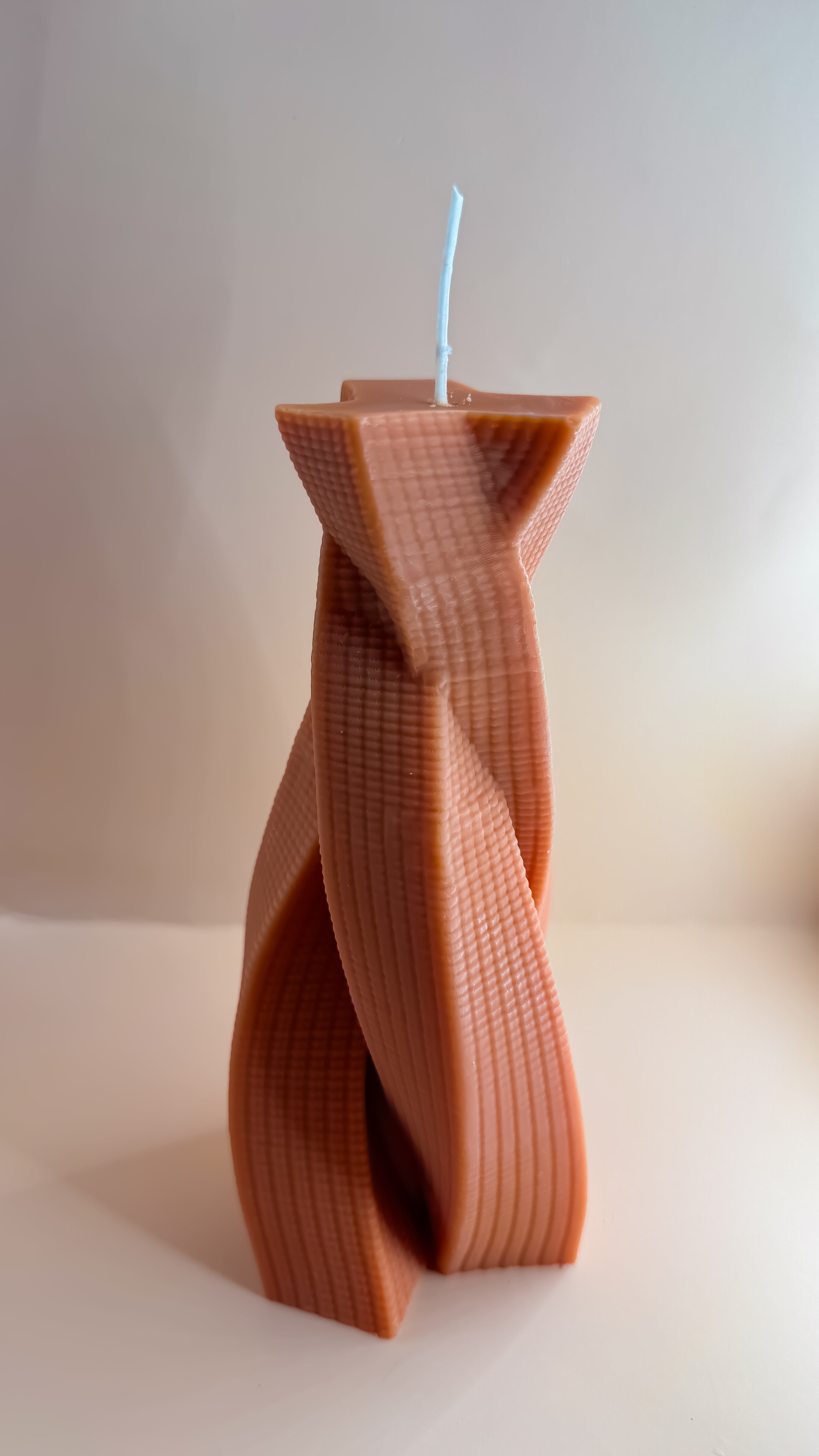 bougie parfumee en forme de tresse terracotta